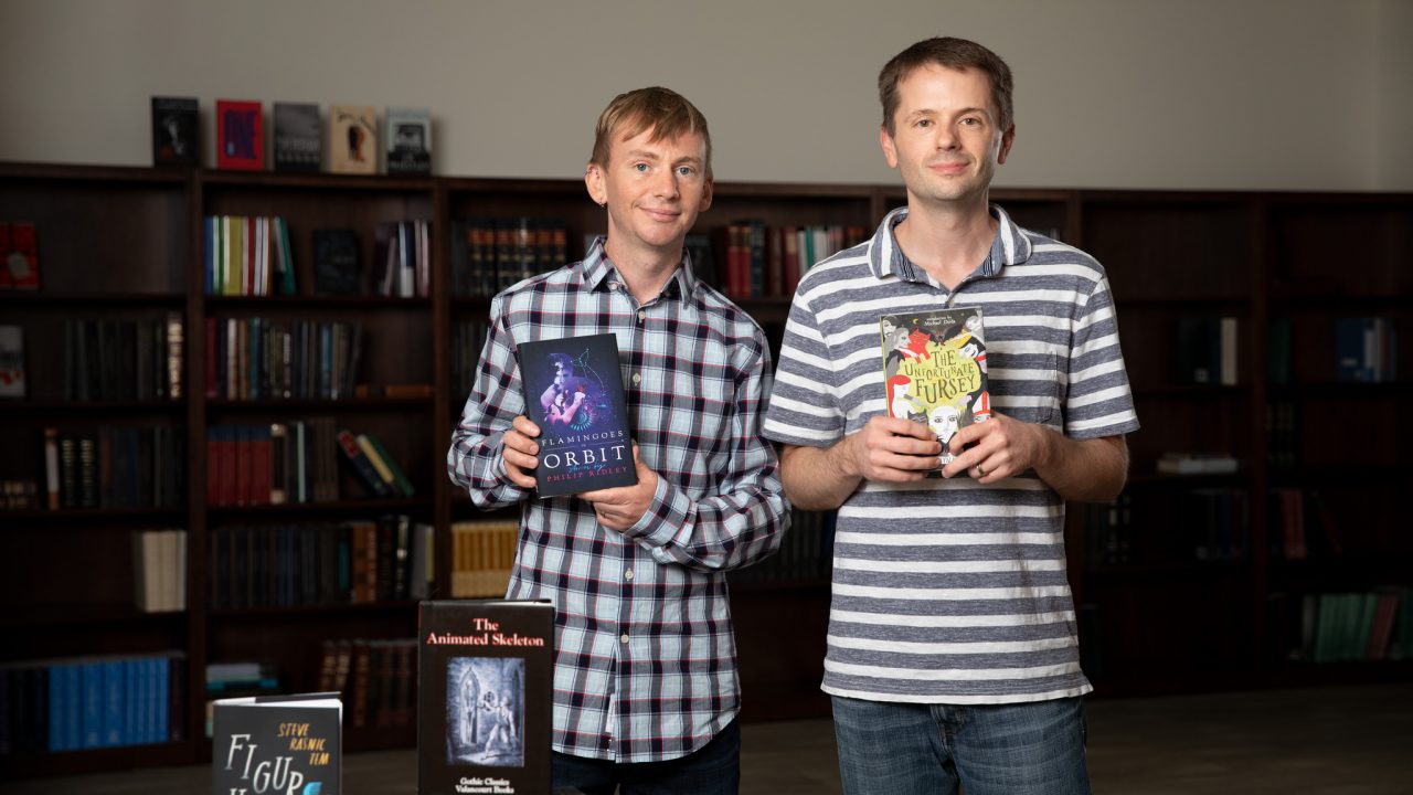 James Jenkins (at right with his husband, Ryan) started Valancourt Books to revitalize rare books. As a small print-on-demand publisher, Valancourt can't afford to give the government two free copies of every book in its catalog.