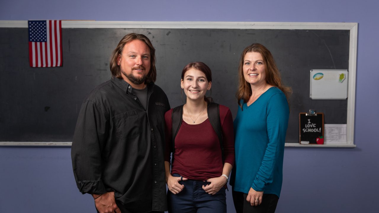 Dave and Amy Carson with their daughter at Bangor Christian Schools in Maine. The Carsons are one of three families that sued Maine over a program that bans families from an otherwise generally available student-aid program if they choose to send their children to schools that teach religion. (Photo by the Institute for Justice www.ij.org.)