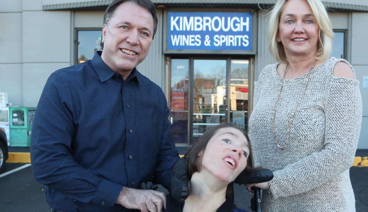 Doug and Mary Ketchum are joined by their daughter, Stacie, outside of their Memphis liquor store, Kimbrough Wine & Spirits. The Ketchums are challenging Tennessee’s anticompetitive licensing law that blocks their ability to own a liquor store because they are newcomers to the state. (Photo by Karen Pulfer Focht, www.karenpulferfocht.com)