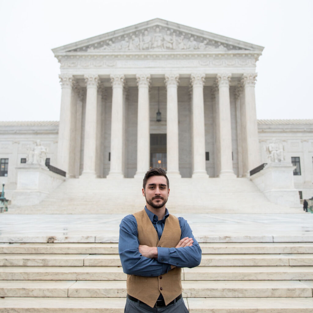 James King’s fight for accountability. James standing outside the U.S. Supreme Court
