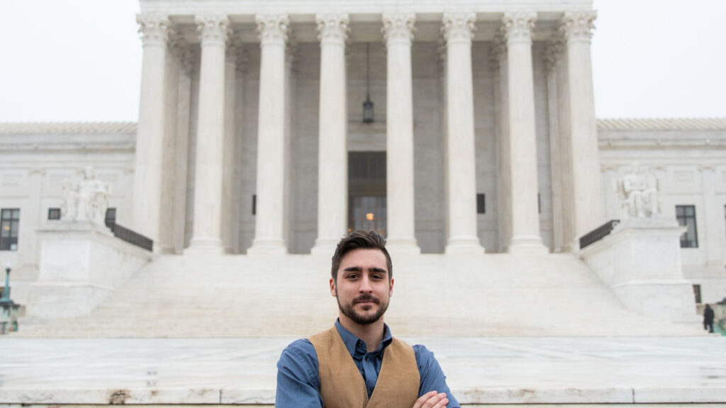 James King’s fight for accountability. James standing outside the U.S. Supreme Court