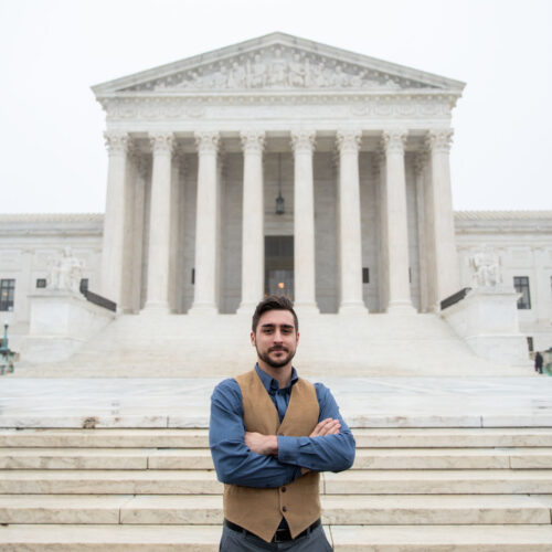 James King’s fight for accountability. James standing outside the U.S. Supreme Court