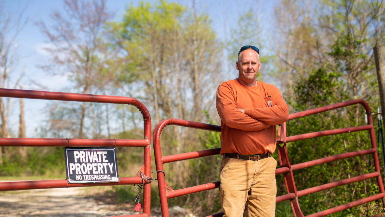 Terry Rainwaters on his property in rural Tennessee.