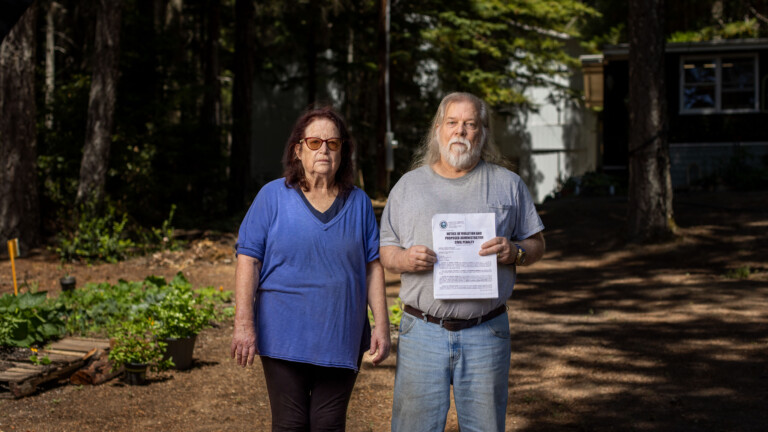 Corrine and Doug Thomas face $1 million in fines because of something the previous owner did.