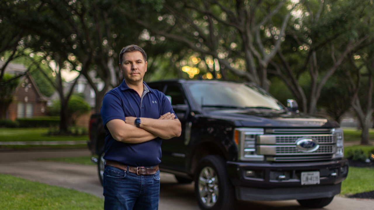 As Alek Schott drove back from a work trip, Bexar County, Texas, deputies used a phony traffic violation and bogus dog alert as an excuse to pull Alek over, interrogate him, and search his truck in a fishing expedition for evidence of a crime.