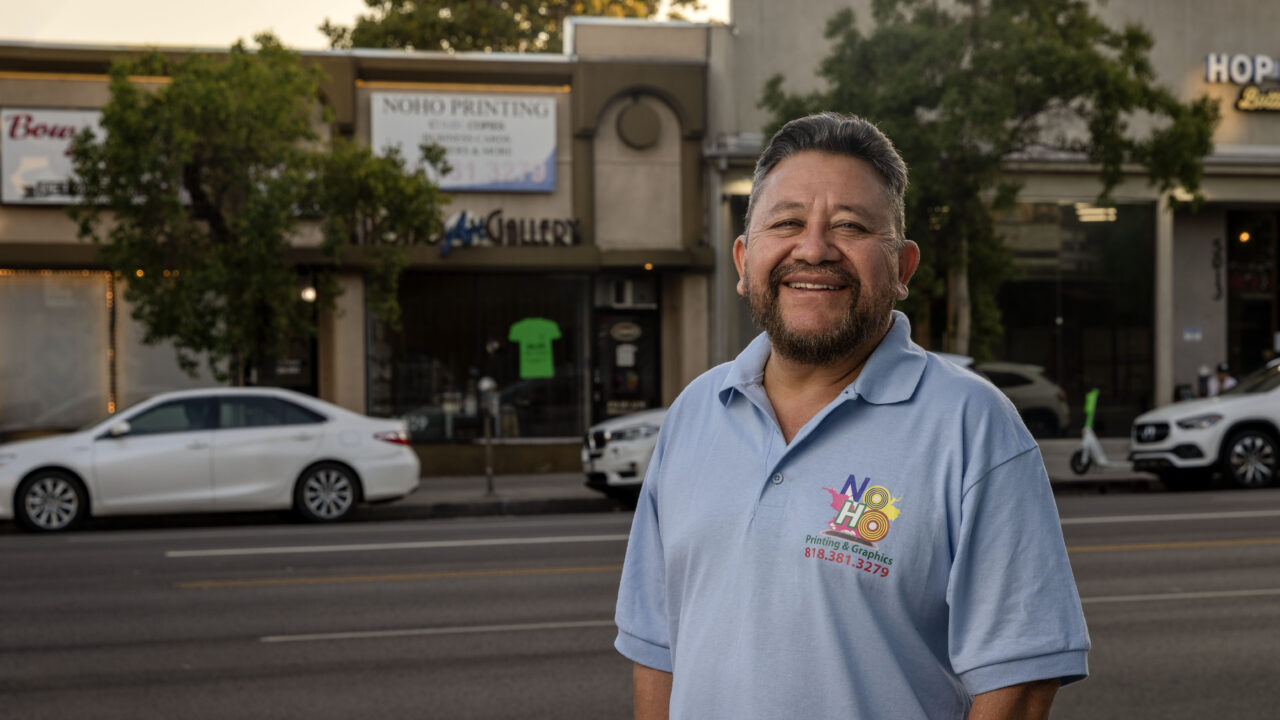 Carlos Pena stands outside his North Hollywood printing shop, which was destroyed by a LAPD SWAT team in August 2022. The city refused to compensate him for the damage.