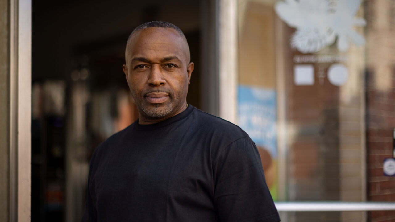Altimont Mark Wilks stands outside Carmen's Corner Store, his Hagerstown business. He is suing the USDA over a policy that prevents him from accepting SNAP benefits because of a decades-old arrest, for which he's already served his time.