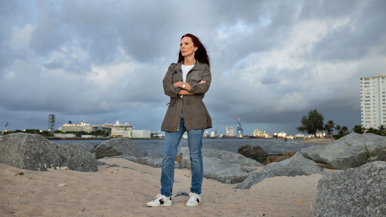 Jennifer Heath Box stands across the water from Port Everglades, where she was arrested in a case of mistaken identity in December 2022.