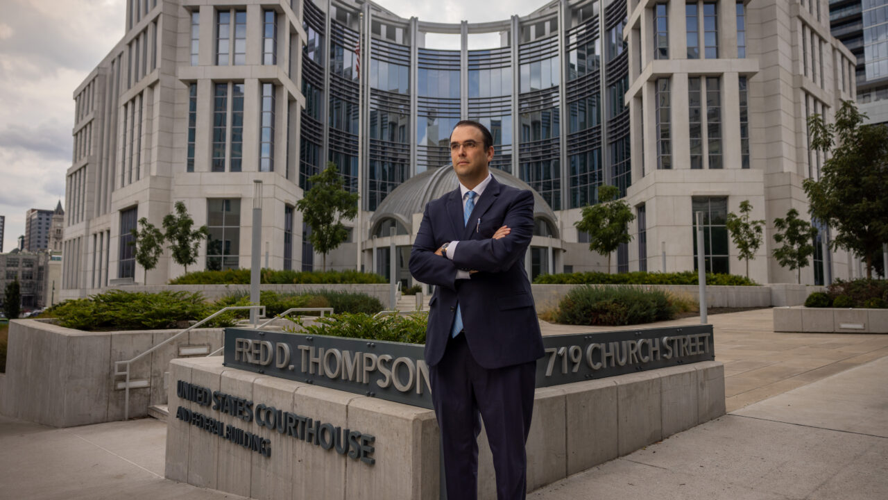 Civil rights attorney Daniel Horwitz stands outside the United States District Court for the Middle District of Tennessee. Daniel has teamed up with the Institute for Justice to file a federal First Amendment lawsuit challenging a rule used by the court to impose a gag order on him.