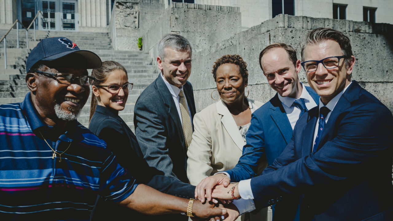 A Texas appeals court ruled that Freeport, Texas, unlawfully took the homes of Pendleton Johnson, Pam Tilley, and other families in the historically black East End neighborhood. Pendleton and Pam stand with their legal team.