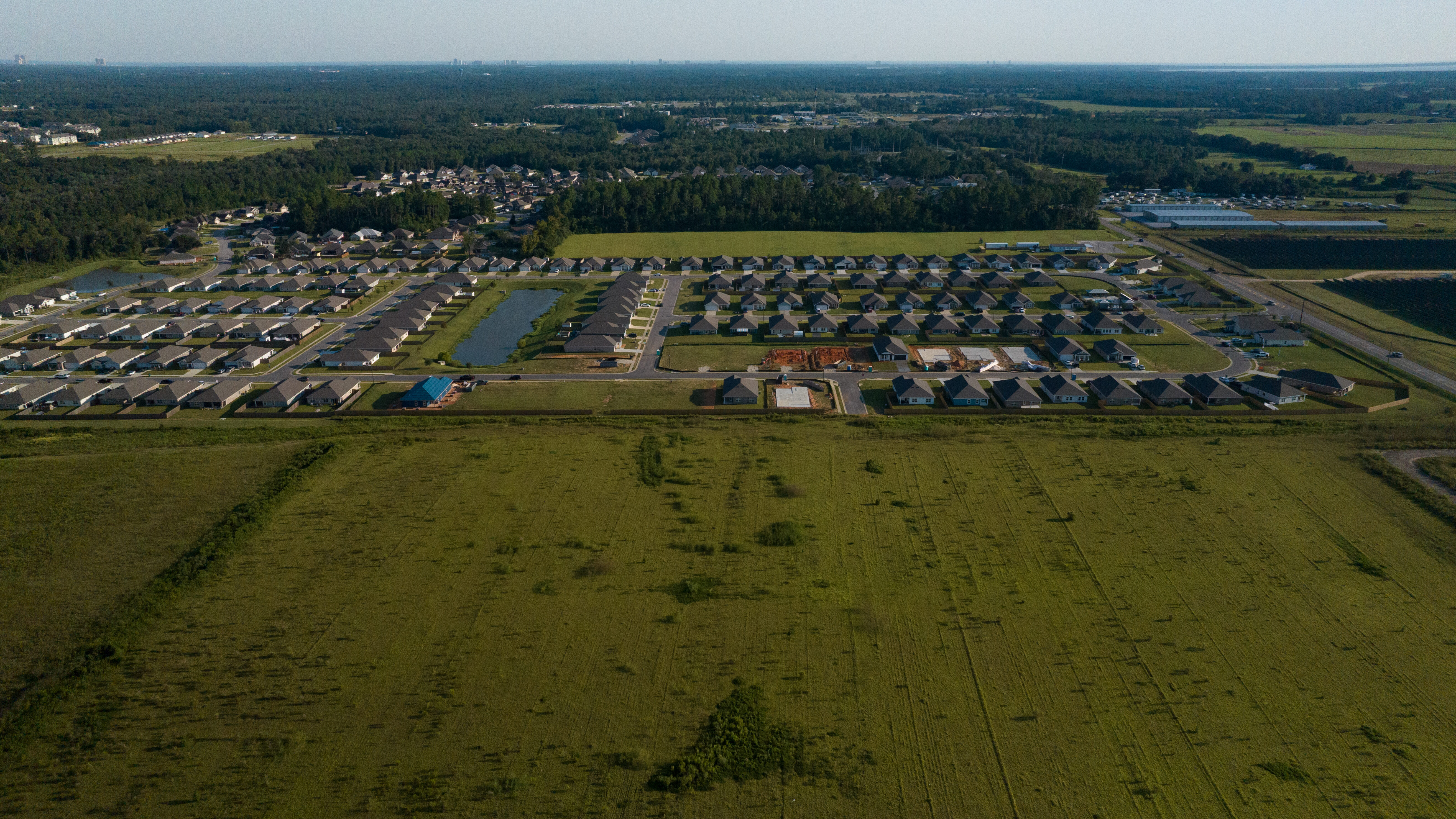 drone shot of homes under construction