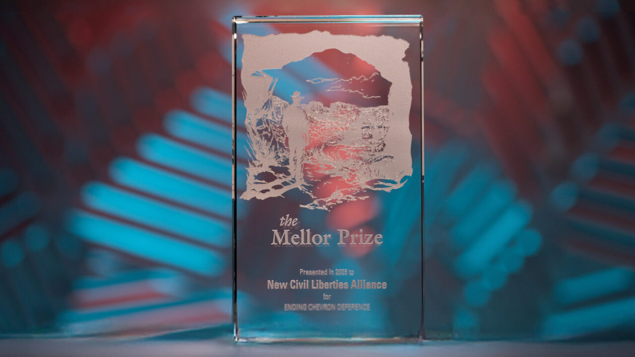 Glass Mellor Prize award engraved with a figure, presented to New Civil Liberties Alliance in 2025