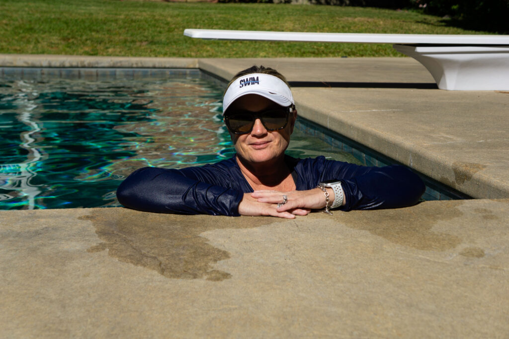 woman standing in pool