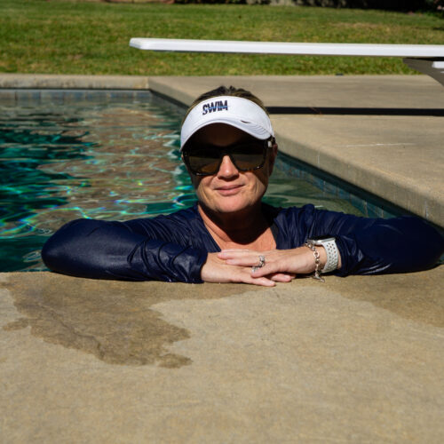 woman standing in pool