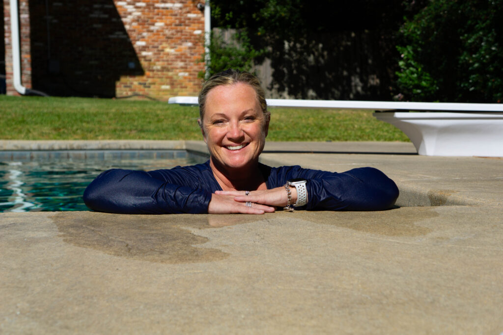 woman standing in pool