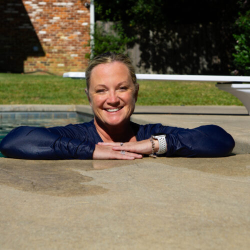 woman standing in pool