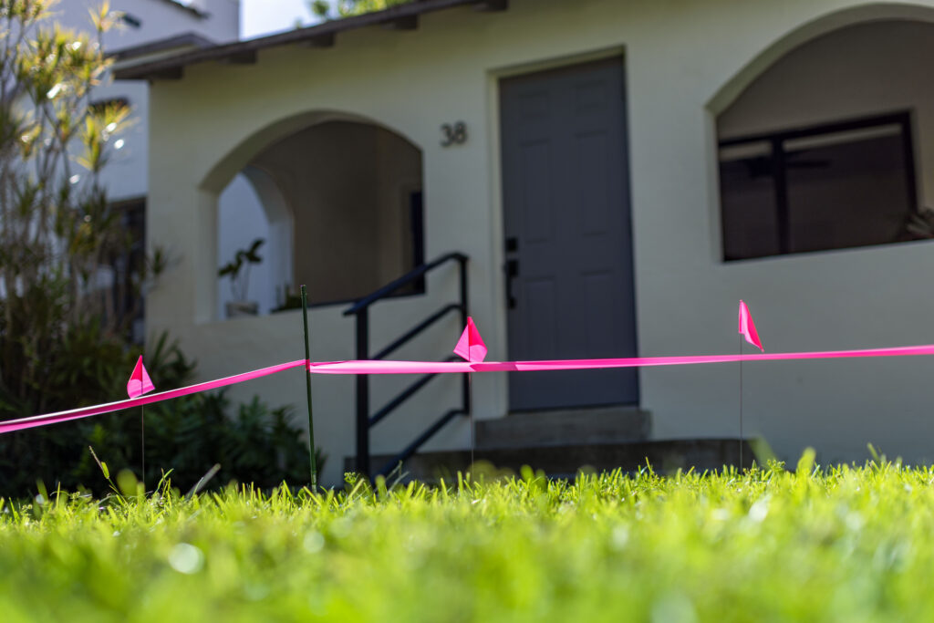A marked line showing the property Miami wants to take from Chad's front lawn.