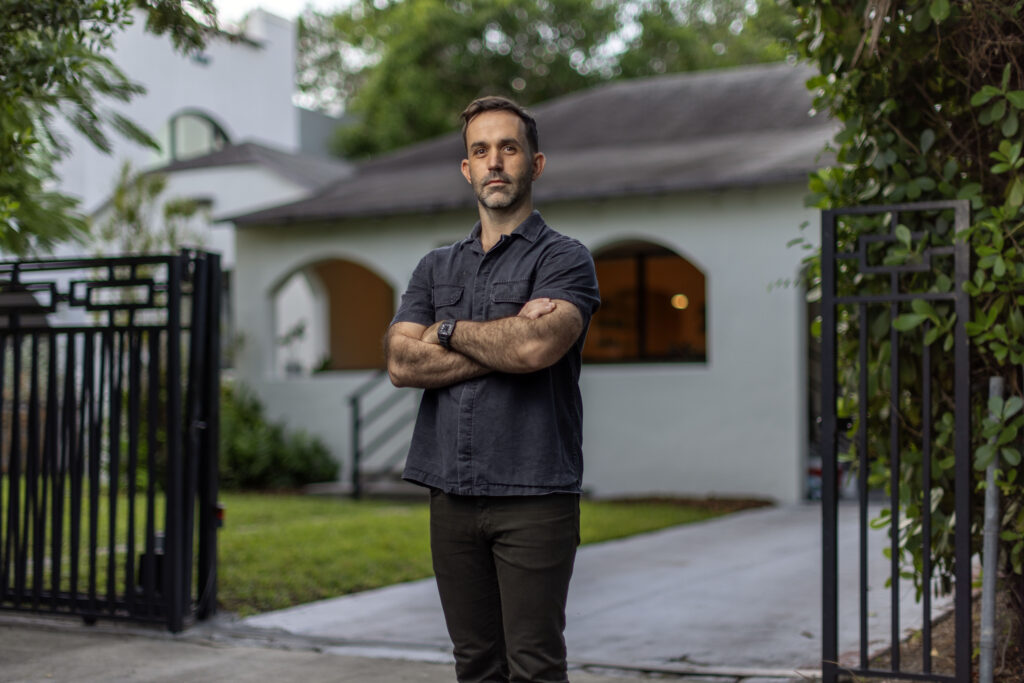 Chad standing in his driveway.