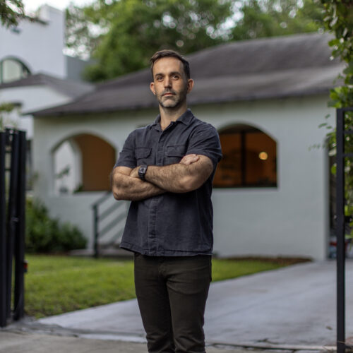 Chad standing in his driveway.