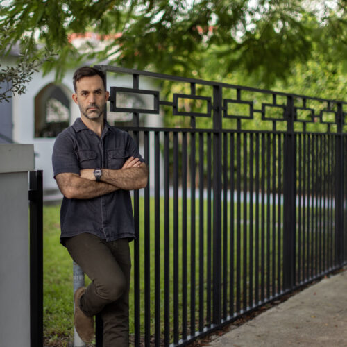Chad standing in front of his house.