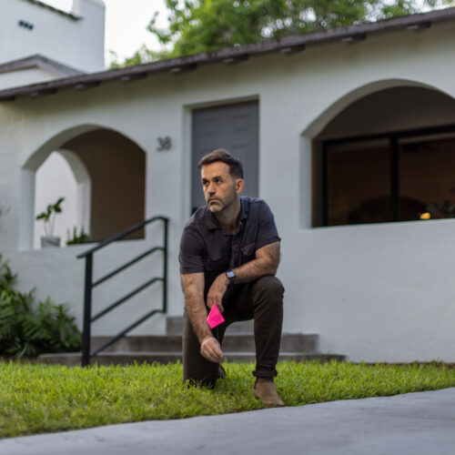 Chad standing in front of his house.