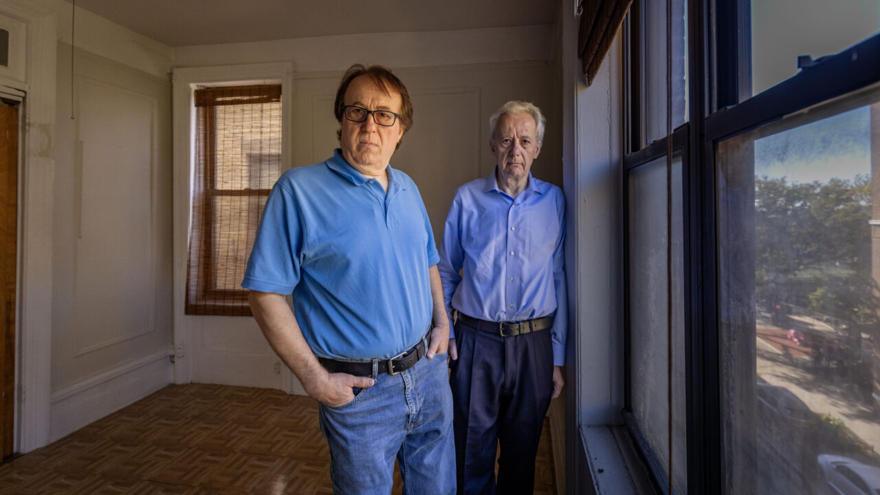 Pashko and Tony Lulgjuraj standing in an apartment building