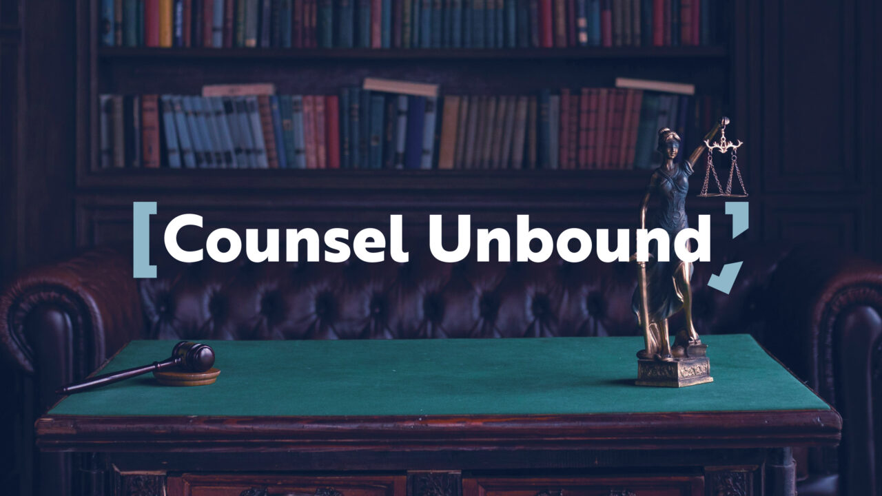 Green-topped table with gavel and Lady Justice statue in law library with white text 'Counsel Unbound' overlaid