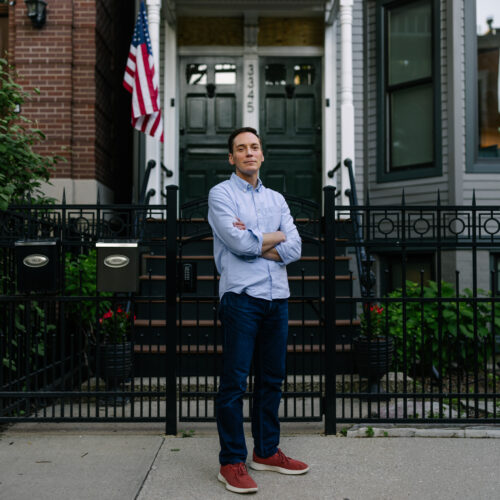 Leo Feler stands outside his home in Chicago, which was warrantlessly raided by Customs and Border Protection officers in October 2025.