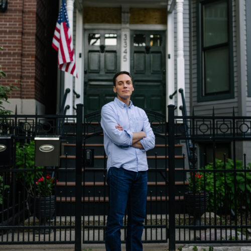 Leo Feler stands outside his home in Chicago, which was warrantlessly raided by Customs and Border Protection officers in October 2025.
