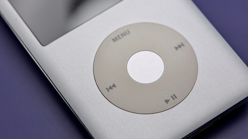 classic portable mp3 player on a blue background.