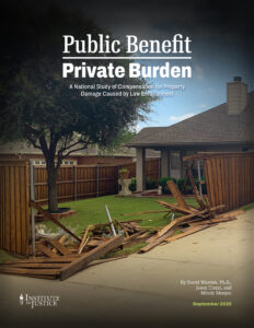 Broken wooden fence panels and debris in a backyard, damage caused by law enforcement