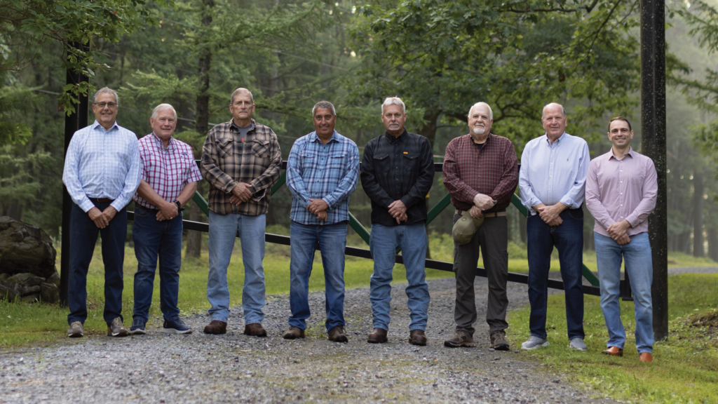 Punxsutawney Hunting Club members stand by a gated driveway after their state supreme court land privacy win