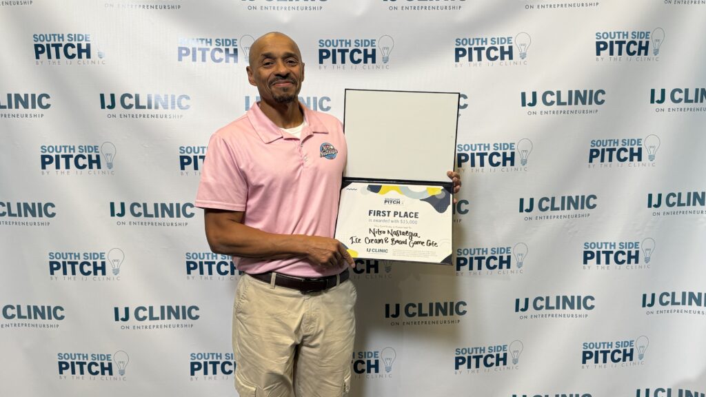 contest winner hold prize