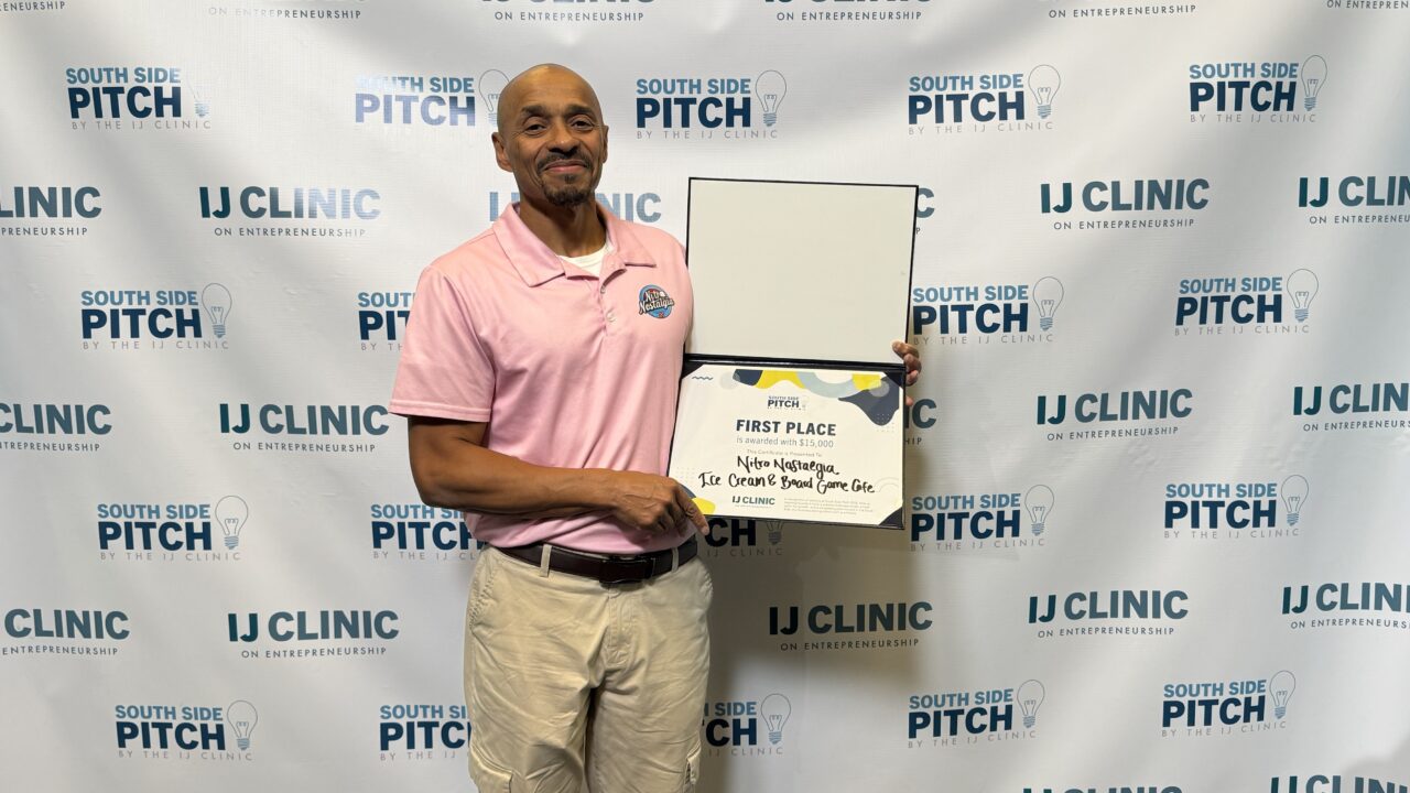 contest winner hold prize